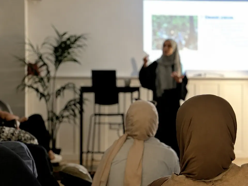 Women attending an educational community session